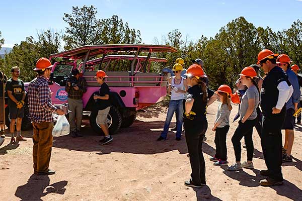 Pink Jeep Tours volunteers gathering for trail work