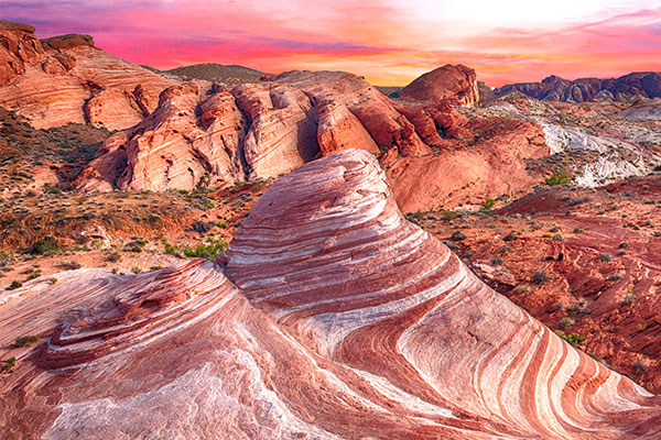 Scenic sunset landscape of Fire Wave Rock in Valley of Fire State Park, Nevada