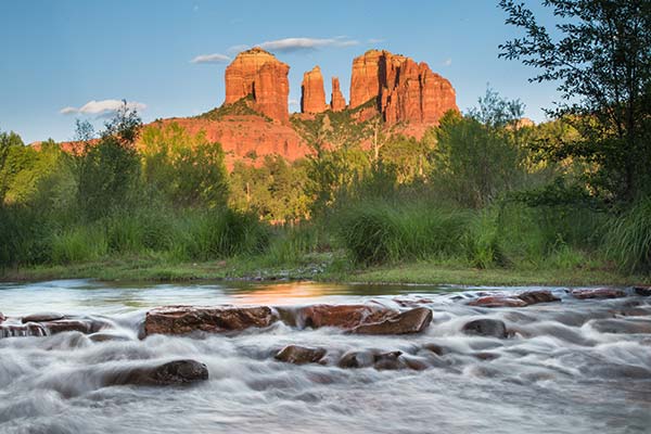 Cathedral Rock and the rushing waters of Oak Creek at Red Rock Crossing, in USFS Crescent Moon Picnic Area, Sedona, AZ.