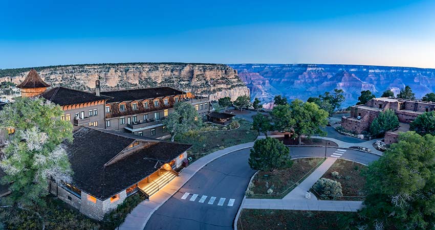 Beautiful twilight view of the legendary El Tovar Hotel and Hopi House surrounded by the South Rim, Grand Canyon National Park.