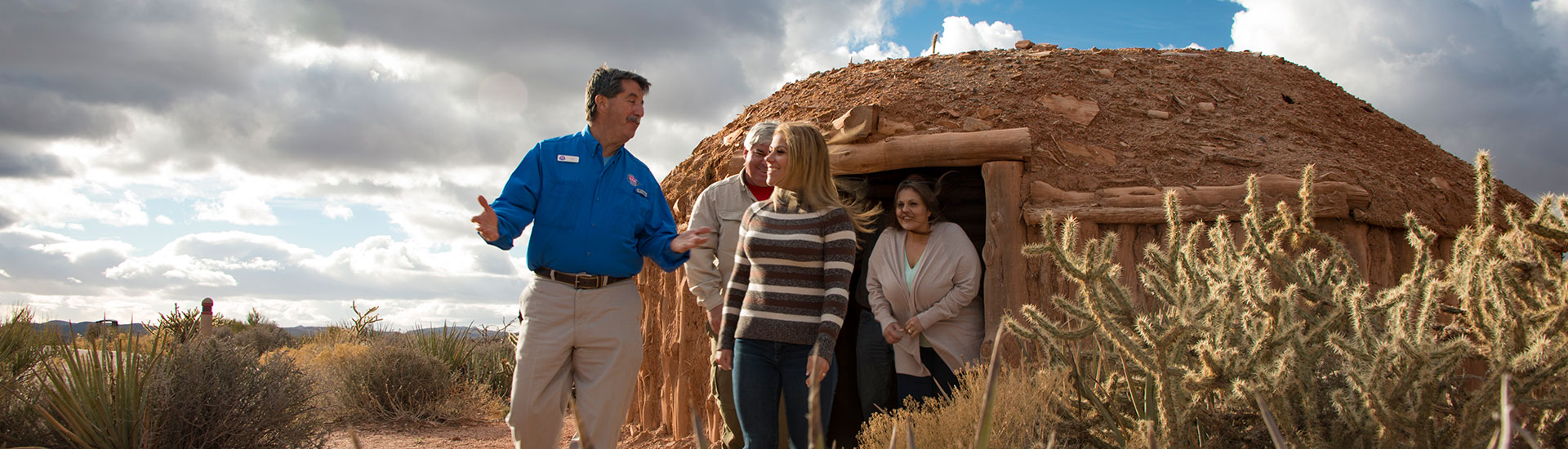 Pink Adventure Tours guide explaining to visitors about Native American history