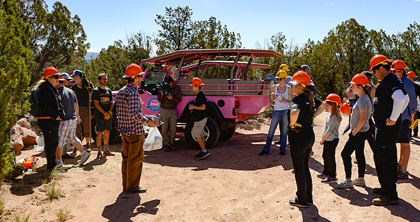Pink Adventure Tours group helping out for trail work day