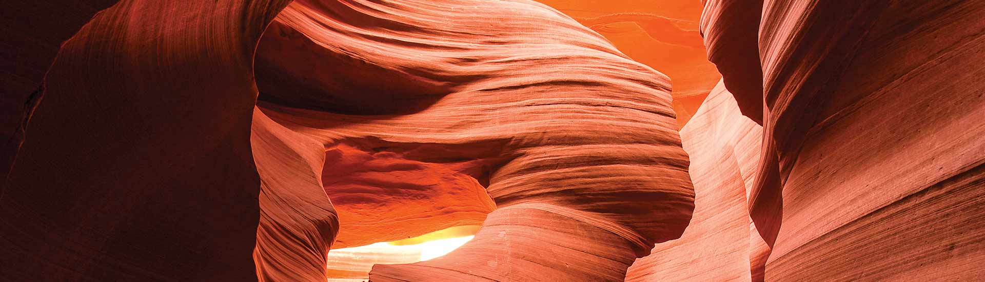 Swirling  orange and red rock formations in Lower Antelope Canyon, Arizona, USA.