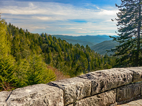 View of Great Smoky Mountains National Park from Newfound Gap with early fall colors.