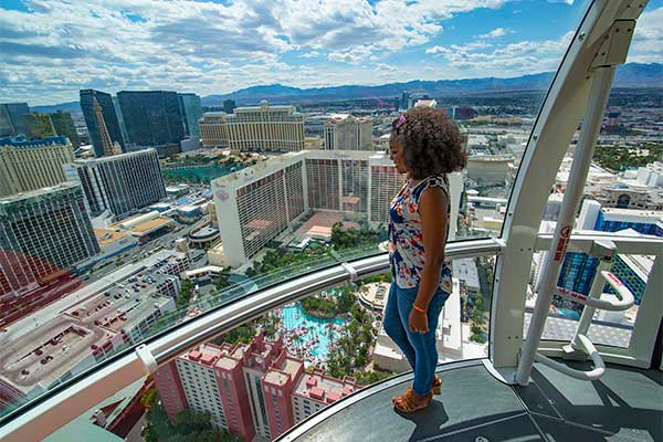 Little girl in Las Vegas High Roller viewing city below