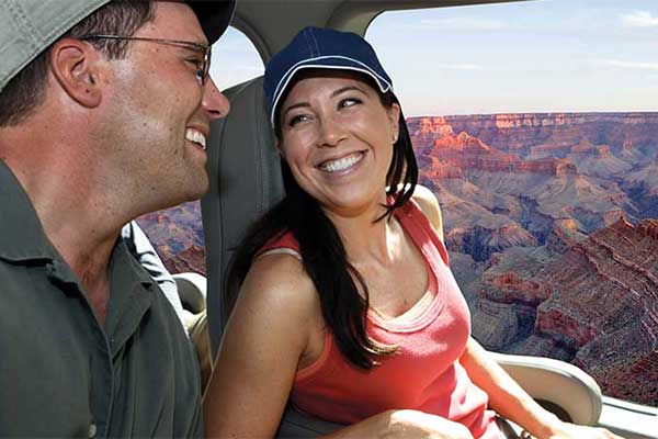 Couple in helicopter touring the Grand Canyon South Rim