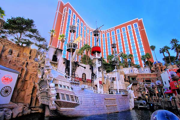 Treasure Island Hotel and Casino with pirate ship. The ultimate Vegas escape on the world-famous Strip.