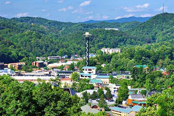 Panoramic view of Downtown Gatlinburg Space Needle overlooking the Smoky Mountains in summer.