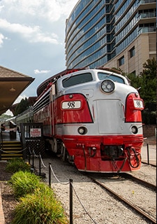 Close-up of the front of the Branson Scenic 98 Train, parked on the tracks at the Branson Scenic Railway Station.