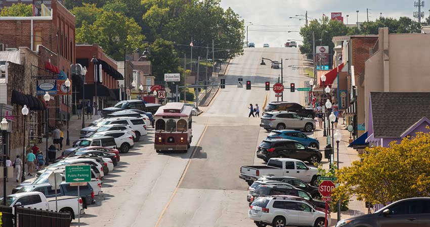 Sparky, the free Downtown Branson Trolley, travels along the hills of Main Street in Historic Downtown Branson, MO.