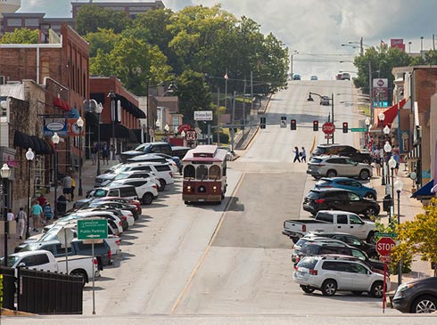 Branson's free trolley, Sparky, travels down Main Street in the Historic Downtown District, Branson, Missouri.
