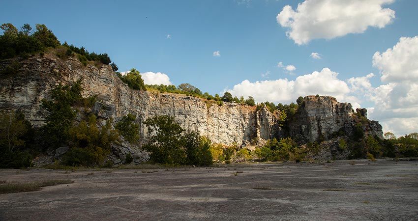 Looking up at the side of Table Rock from the shoreline of Table Rock Lake, Branson, MO.