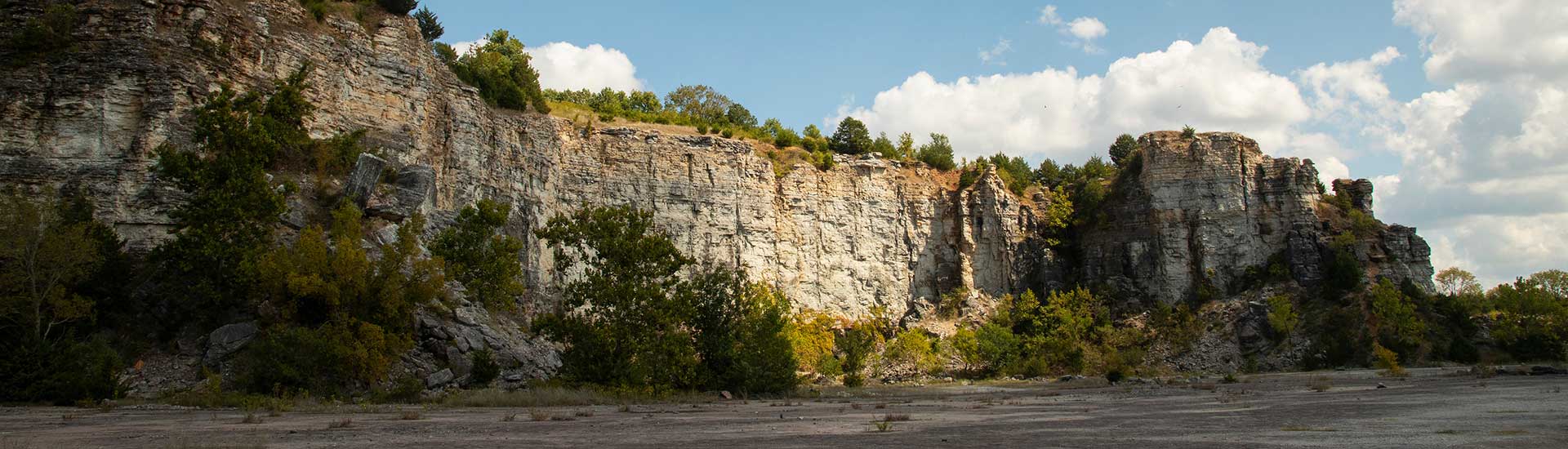Looking up at the cliff face of Table Rock from the shoreline of Table Rock Lake, Branson, MO.