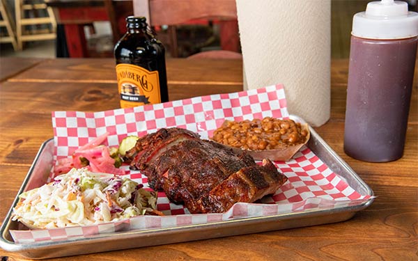 Plate of ribs and sides at Big D's BBQ, voted Branson's Best BBQ four years in a row.