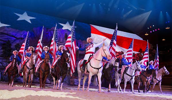 Dolly Parton's Stampede Dinner Show features a four-course meal, 32 magnificent horses and dazzling trick riders.