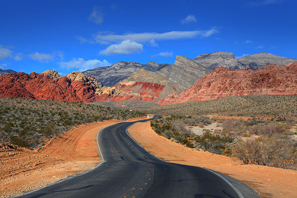 Scenic road winding through Red Rock Canyon National Conservation Area, Nevada.