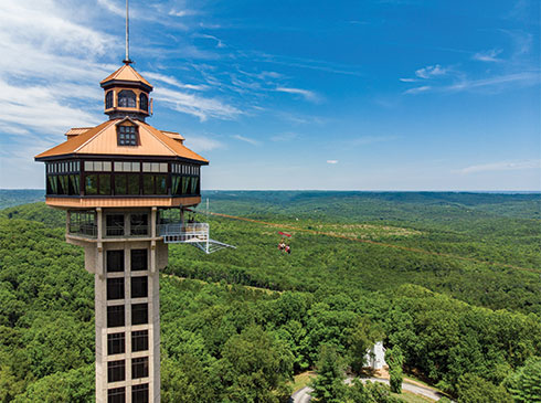 Beautiful summertime view of the Inspiration Towering overlooking the legendary Shepherd of the Hills, in Branson, Missouri.