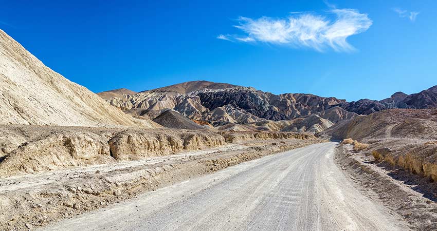 Dirt road in Twenty Mule Team Canyon in Death Valley National Park in California, Pink Adventure Death Valley Tour.