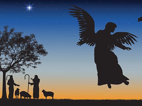 Silhouettes of Christmas shepherds with flock, and flying angel, against a starlit sky at twilight with the bright Northern Star.