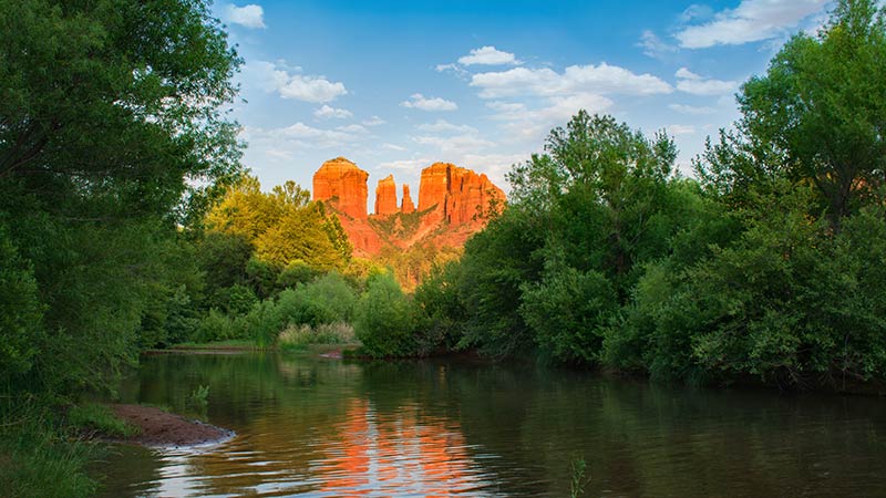 Sedona's famous Cathedral Rock in Coconino National Forest, with it's reflection in Oak Creek in the forground.