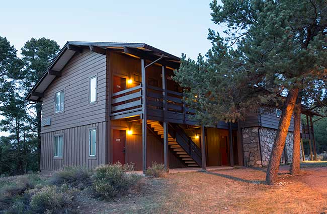 Maswik Lodge North at dusk with surrounded by Ponderosa pine trees, Grand Canyon National Park, USA.