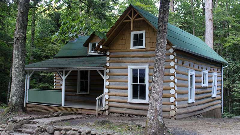 Restored log cabin in the forest near the Elkmont Historic District in the Great Smoky Mountains.