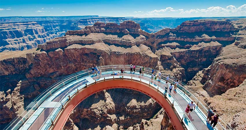 Aerial view of people walking on the glass skybridge overhanging the Grand Canyon West Rim on the Hualapai Indian Reservation, Arizona.