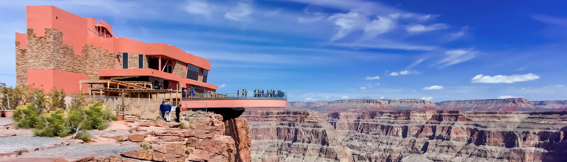 People standing on the Grand Canyon Skywalk at Eagle Point, overlooking the canyon's West Rim on the Haualapai Indian Reservation.