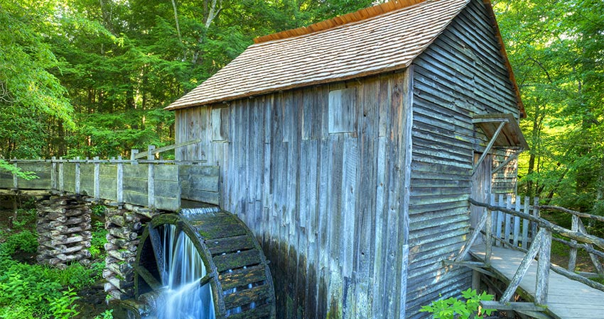 Flowing waterwheel at the historic John P. Cable Grist Mill in Cades Cove, Great Smoky Mountains National Park, TN.