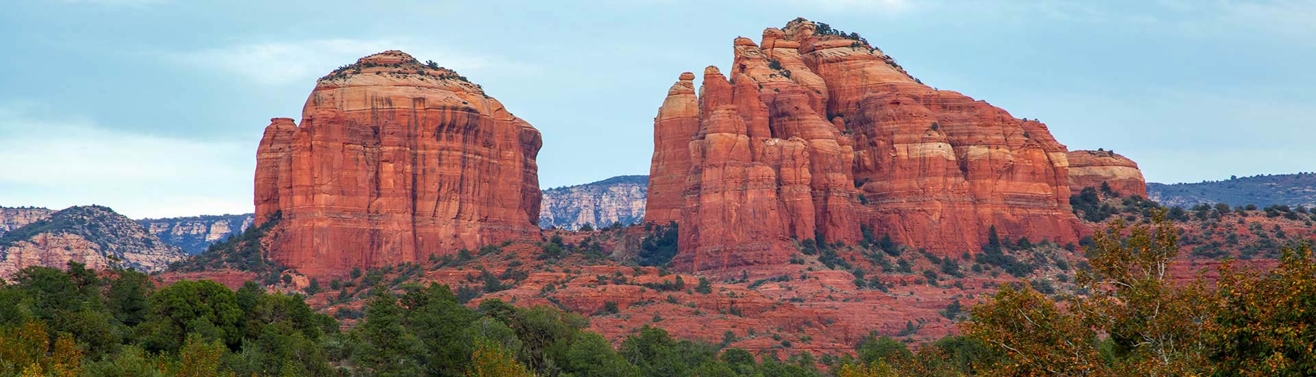 Close-up of the Cathedral Rock and Courthouse Butte crimson rock formations seen from Red Rock State Park, Sedona, Arizona.
