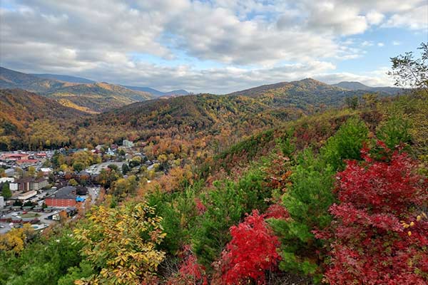 Fall foliage is seen from Skybridge Park overlooking the Smoky Mountain foothills around Gatlinburg, Tennessee
