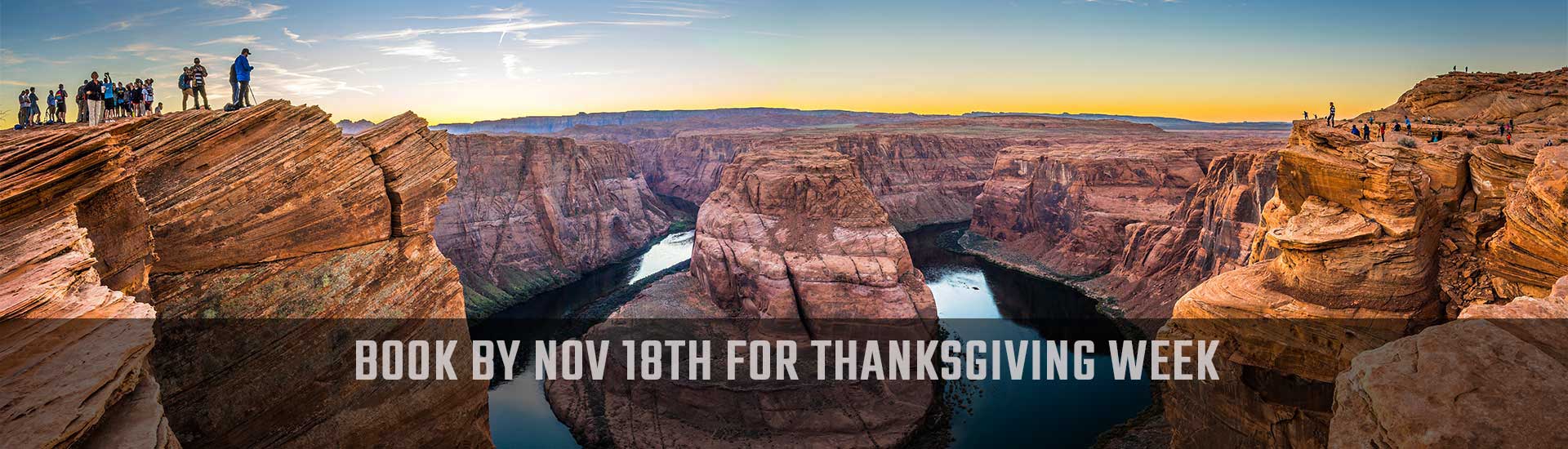 Vistors standing at lookout point over Horseshoe Bend, Arizona, with Book by Nov 18th for Thanksgiving Week banner.