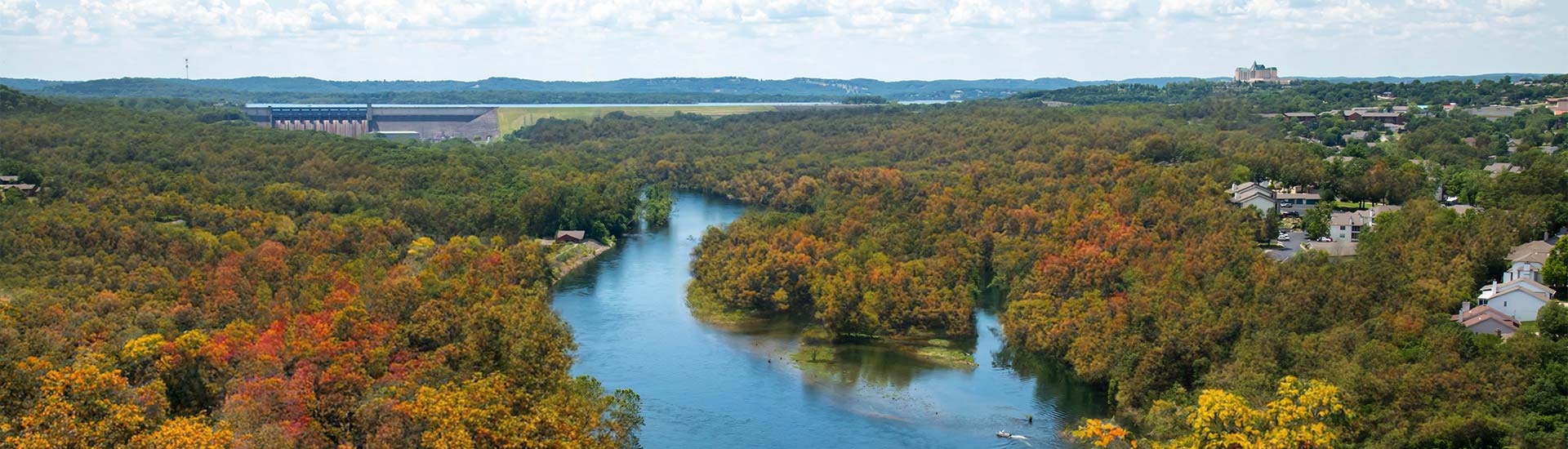 Panoramic view of Lake Taneycomo, Table Rock Dam and the Branson hills with early fall colors, seen from the Branson Scenic Overlook, Branson, MO.