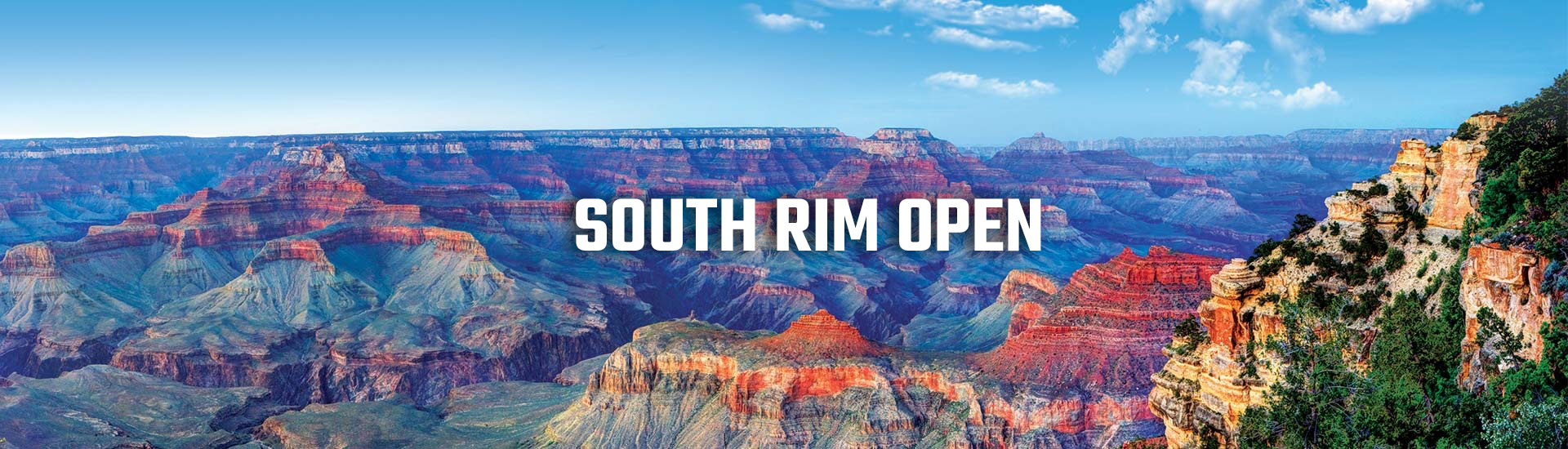 Vibrant summertime view of the colorful, layered canyon walls from the Grand Canyon South Rim, with South Rim Open banner.
