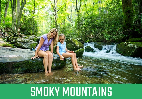 Mother and daughter with feet in Smoky Mountain Creek