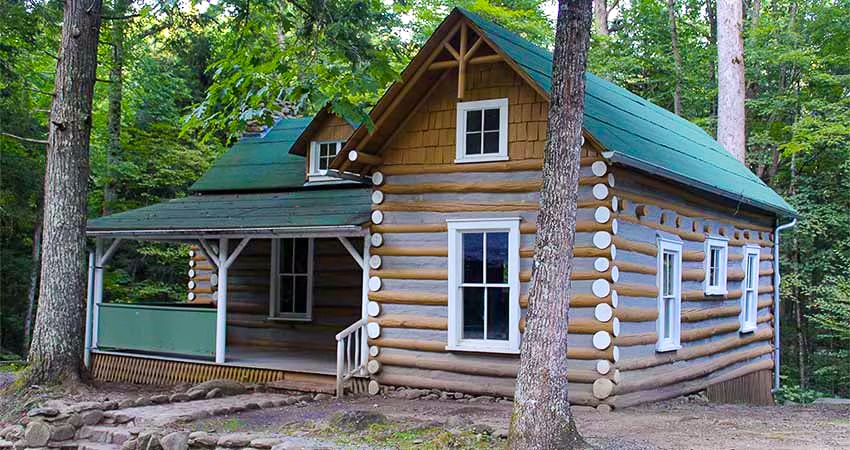 Restored log cabin in the forest near the Elkmont Historic District in the Great Smoky Mountains, Tennessee.
