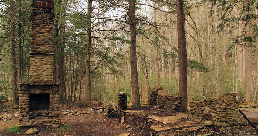 Autumn view of stone chimney relics in the forest near Elkmont Ghost Town, Great Smoky Mountains National Park, TN.