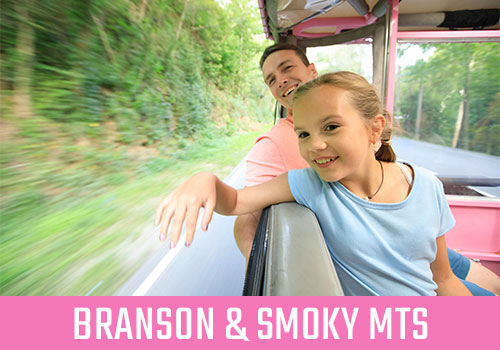 Father and daughter riding in Jeep, smiling. Text overlay says "Branson & Smoky Mts."