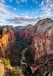 Aerial view of the Virgin River as it cuts through the 2000-foot-deep canyon of Zion National Park, Pink Adventure Tours day trip from Las Vegas.