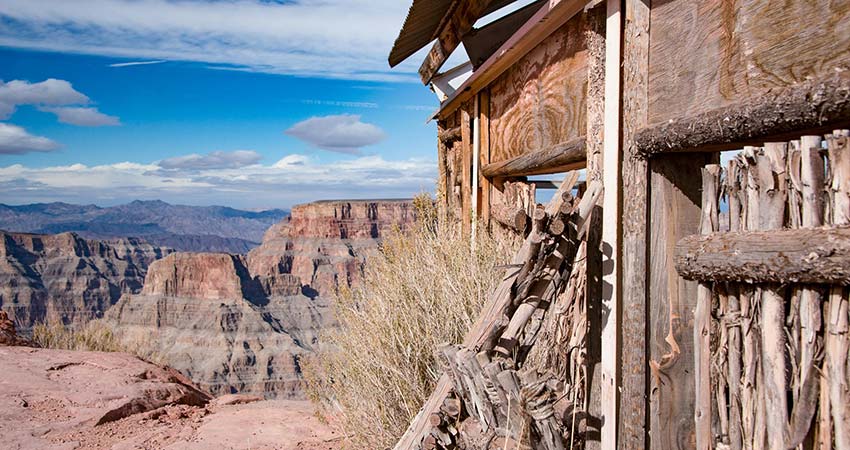 Rustic wood building at Guano Point overlooking the Grand Canyon West Rim on the Hualapai Indian Reservation.