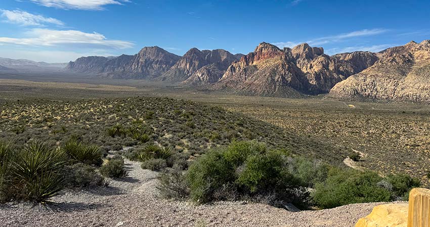 Panorama of the grasslands and outcrops at Red Rock Canyon National Conservation Area near Las Vegas, Nevada on a beautiful summer day.
